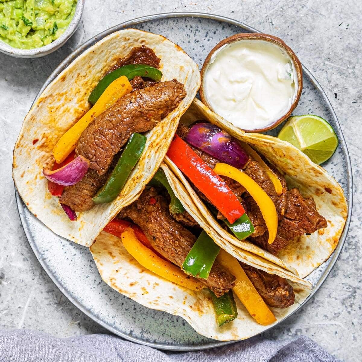 Steak Fajitas with Lime Wedges