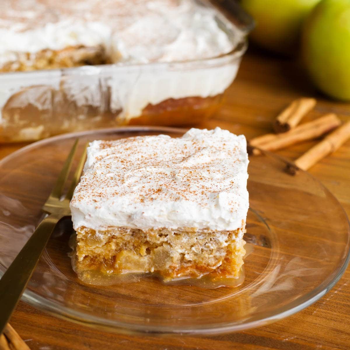 Caramel Apple Poke Cake with Powdered Sugar