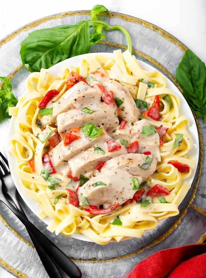 Creamy Italian Chicken Breasts with Basil Leaves