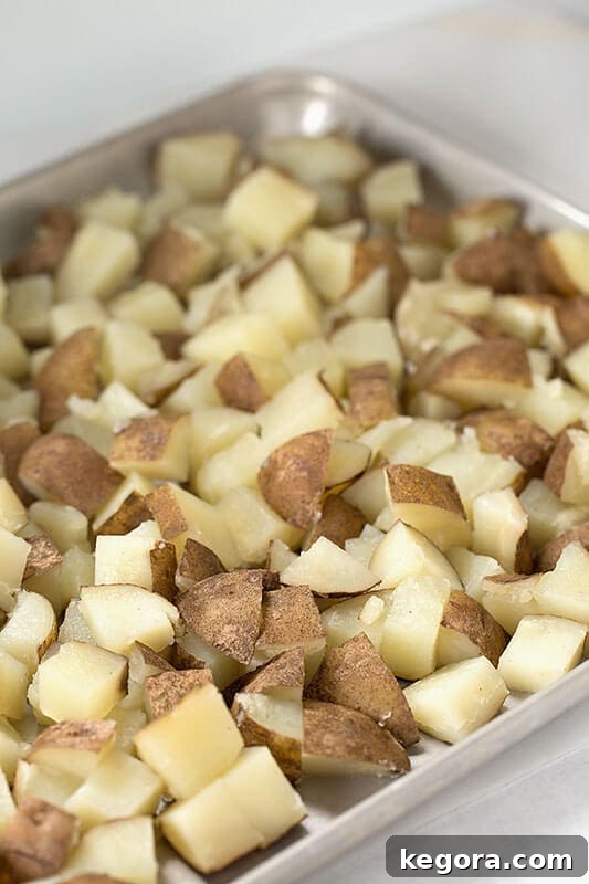 Effortless Instant Pot Potato Salad 4 Cooked dice potatoes in metal baking sheet