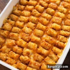 Crispy Tater Tot Comfort Casserole 6 Hotdish Tater Tot Casserole in a white baking dish