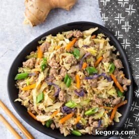 A top-down view of a delicious Instant Pot Egg Roll in a Bowl, showcasing its colorful ingredients and appetizing presentation, perfect for a low-carb meal.