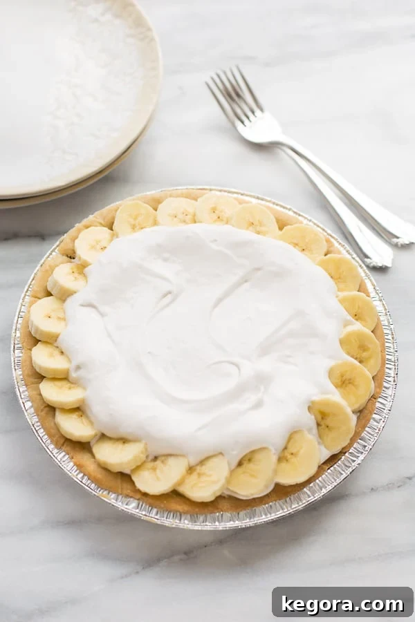 Decadent Gluten-Free Vegan Banana Cream Pie 3 banana cream pie in serving dish with bananas