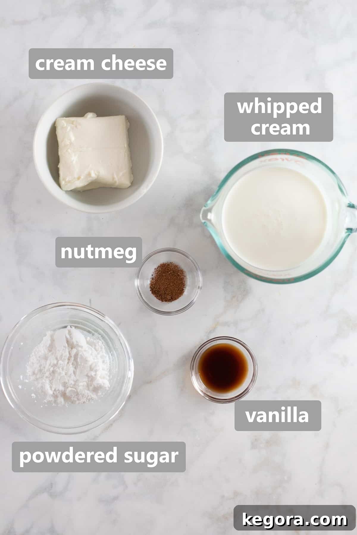 Decadent Gluten-Free Pumpkin Cheesecake 7 Overhead shot of ingredients to make the cheesecake topping, including cream cheese, whipping cream, and nutmeg.