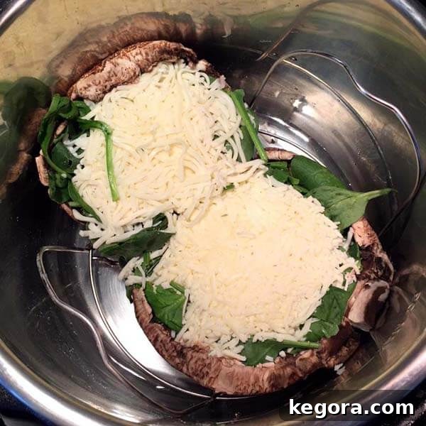 An uncooked portobello mushroom pizza resting inside a pressure cooker, ready to be transformed into a healthy low-carb meal.