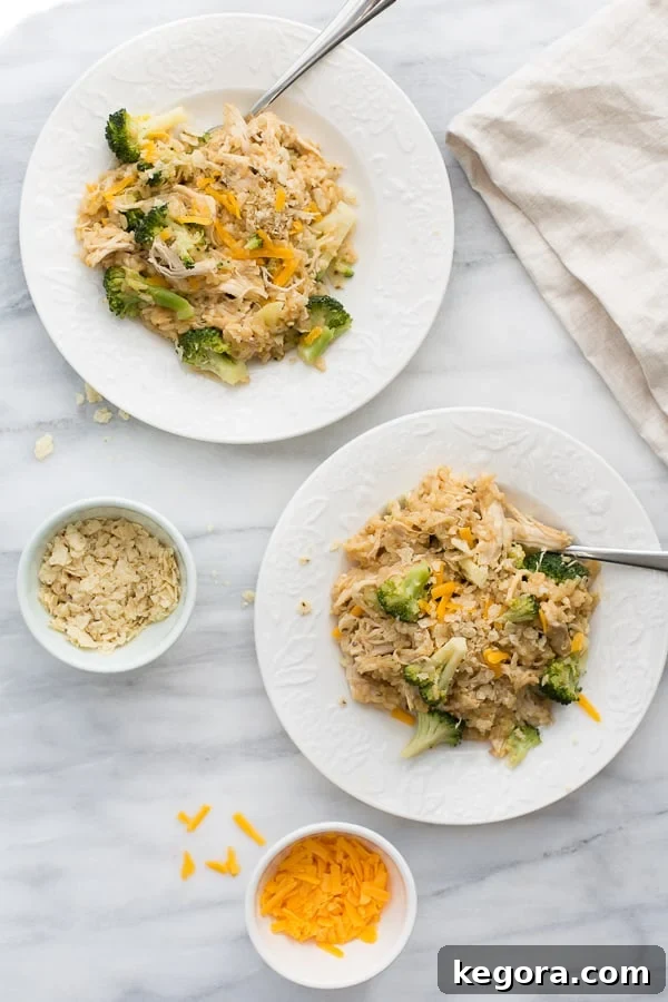 Instant Pot Chicken and Broccoli Rice 2 overhead shot of chicken, broccoli, and rice on white plates topped with chips and cheese