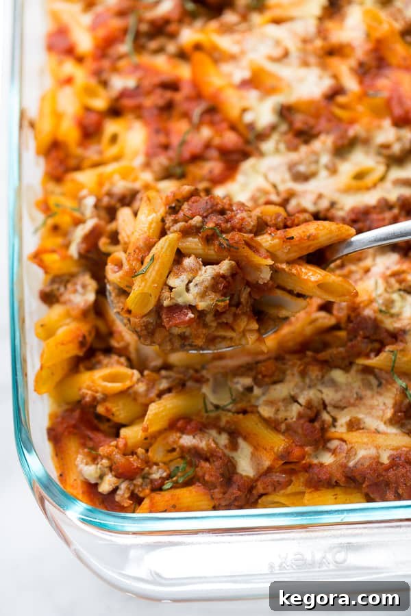 Creamy Vegan Gluten-Free Baked Ziti 2 A perfectly baked dairy-free ziti with a golden-brown top, ready to be served.