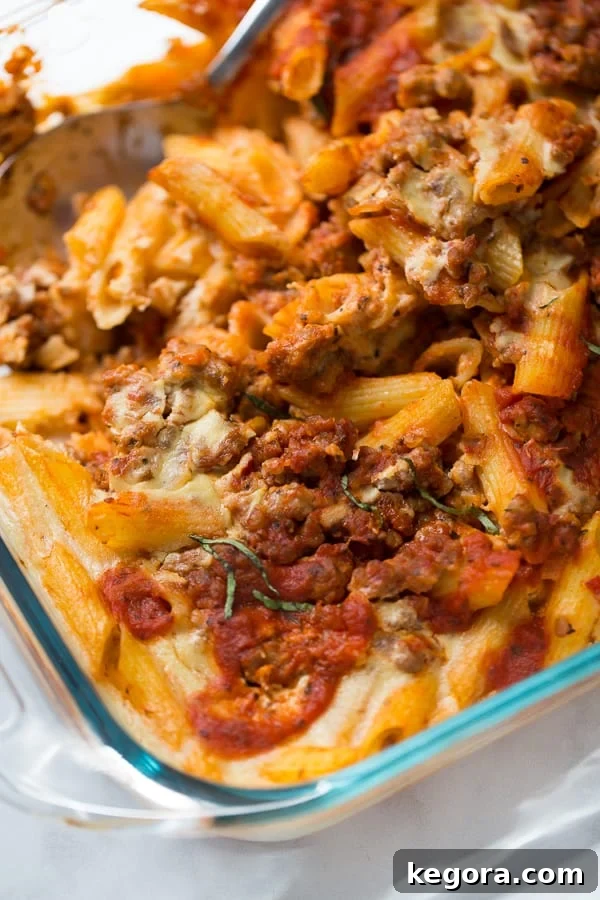 Creamy Vegan Gluten-Free Baked Ziti 4 A freshly baked pan of dairy-free baked ziti, bubbling and golden, ready for serving.