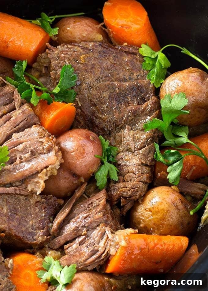 Closeup of incredibly tender Pot Roast with carrots and potatoes