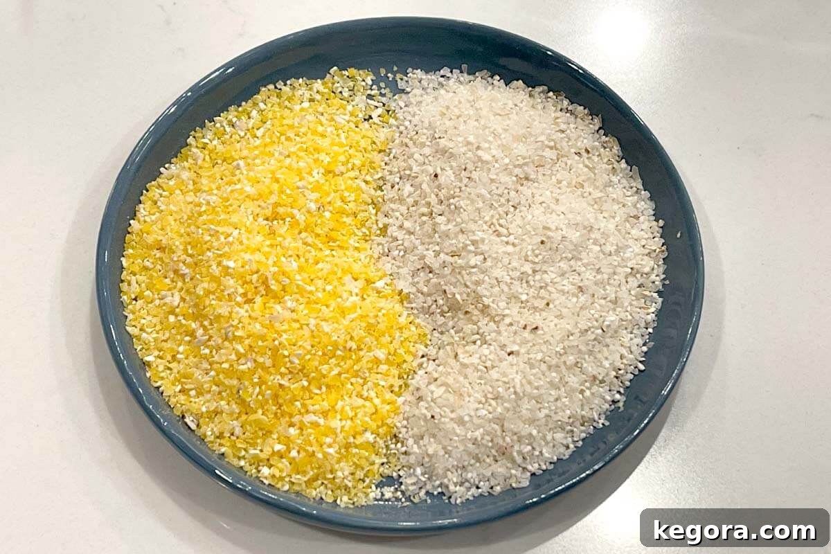 Effortless Slow Cooker Cheesy Grits 4 A plate featuring both yellow and white grits, highlighting the visual difference.