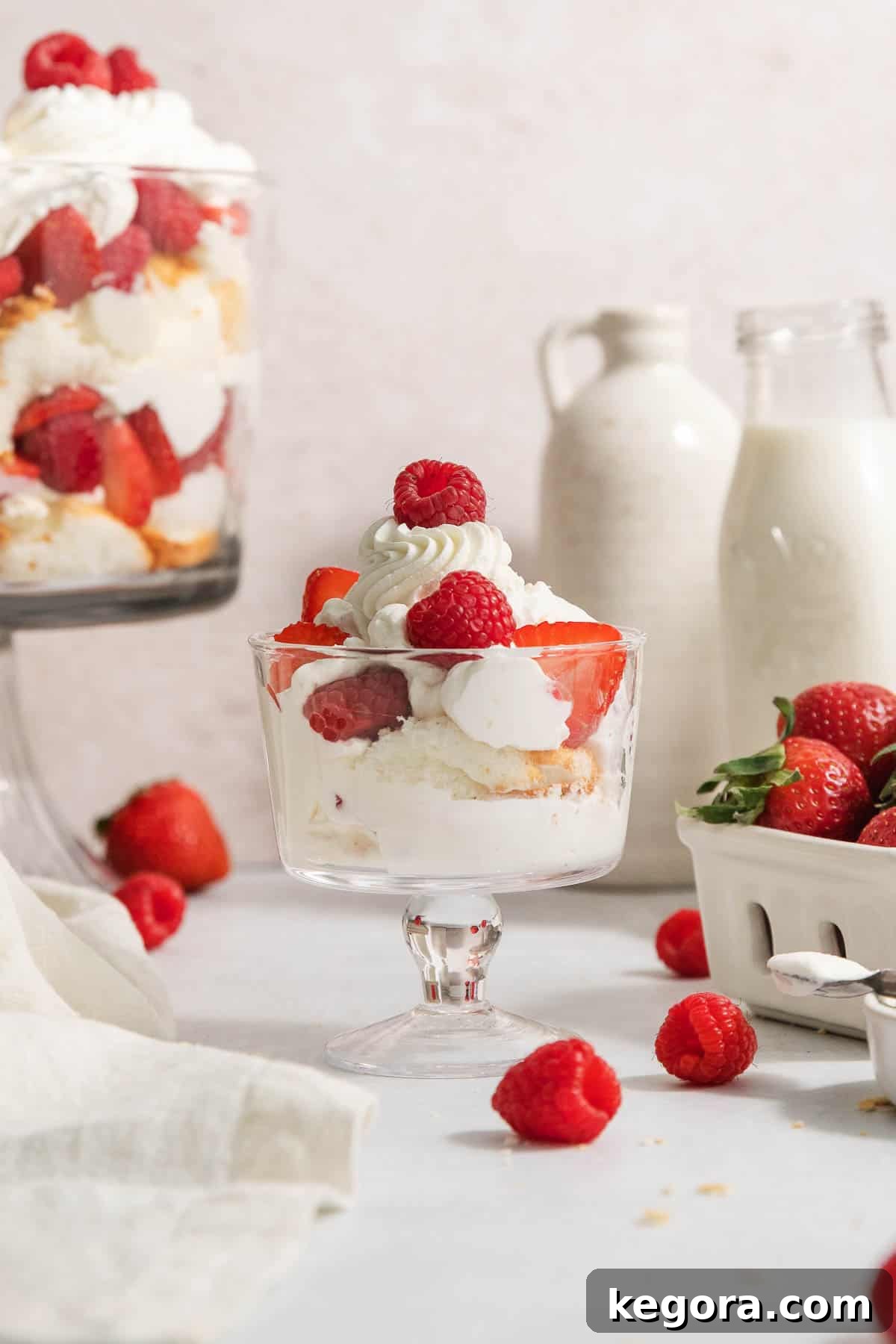 Luscious Gluten-Free Strawberry Cream Cheese Trifle 9 A single serving of the gluten-free strawberry cream cheese trifle presented beautifully in a small, clear glass dish, highlighting all its delicious layers.