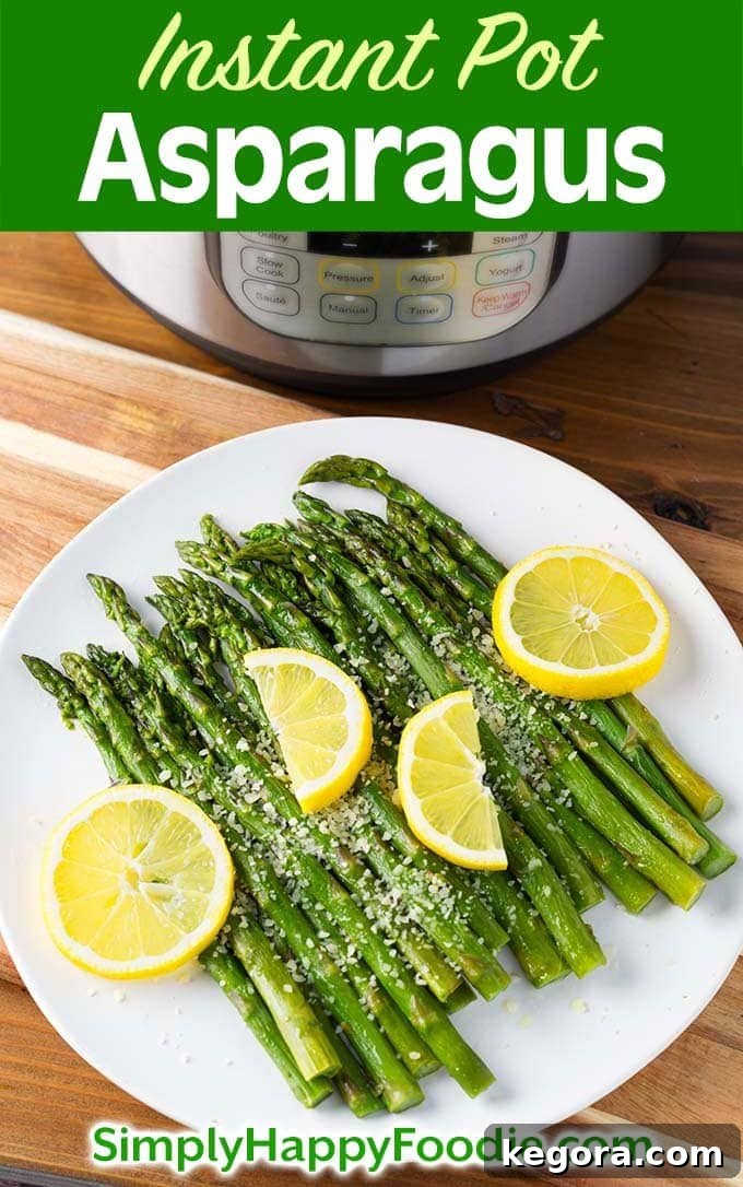 Pinterest graphic featuring a plate of Instant Pot Asparagus with lemon, recipe title, and Simply Happy Foodie.com logo, perfect for sharing and saving.