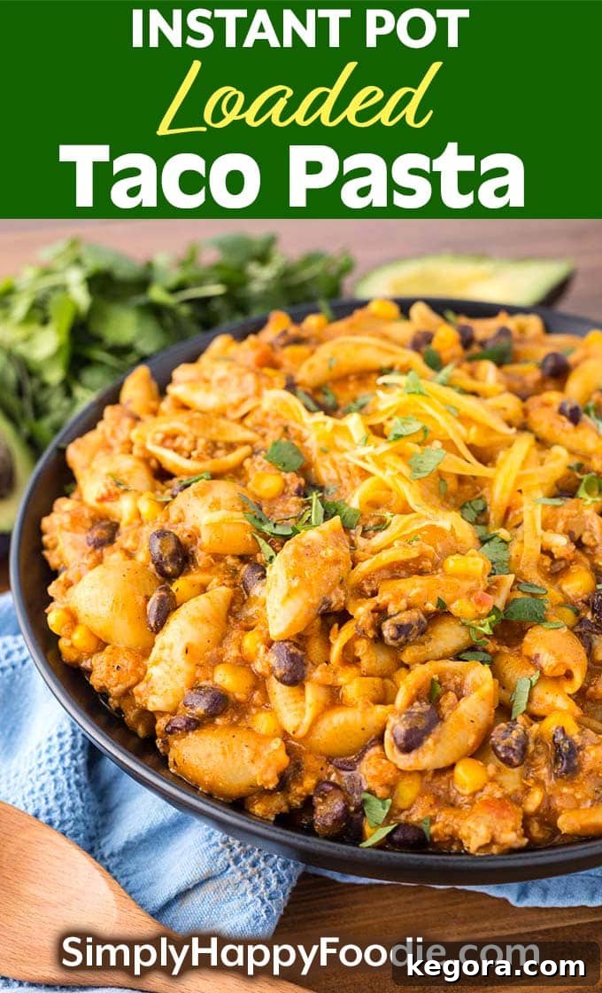 Instant Pot Loaded Taco Pasta on a black plate with the Simply Happy Foodie.com logo, perfect for Pinterest