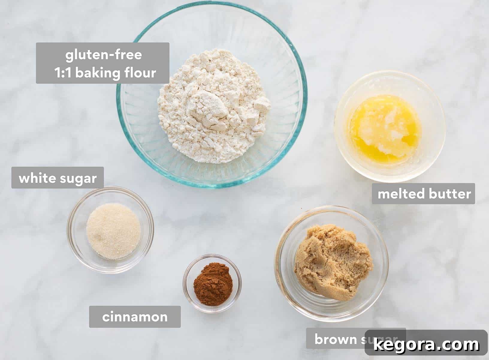 Apple muffin crumb ingredients in small bowls on the counter
