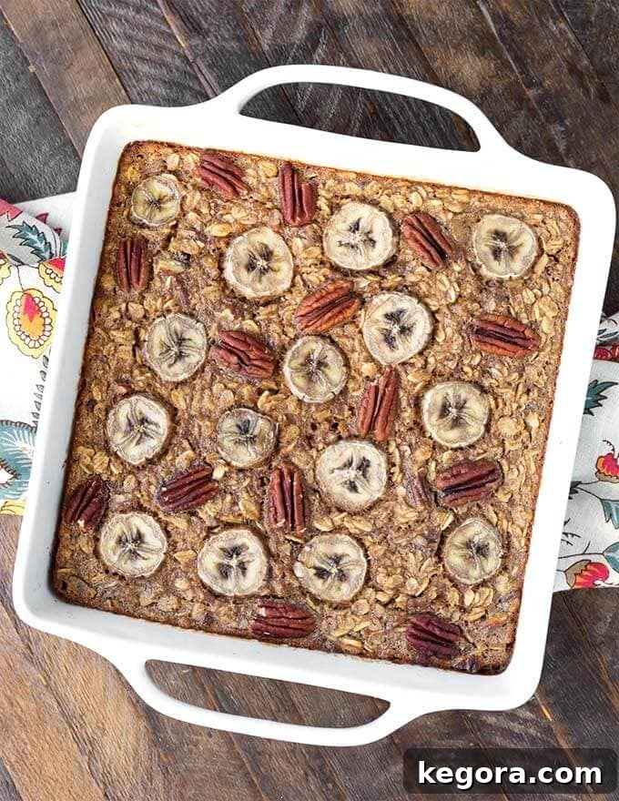 Warm Banana Bread Oatmeal Bake 2 Banana Bread Baked Oatmeal in white square baking dish