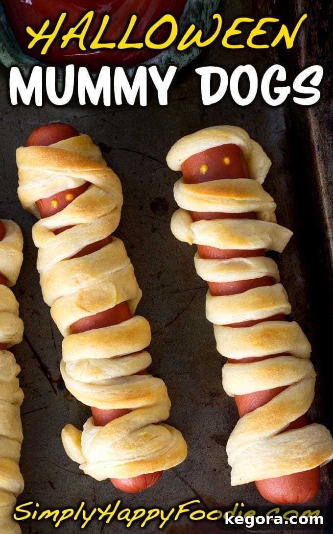Fright Night Frank Wraps 10 Halloween Hot Dog Mummies, a spooky treat for Halloween parties. This is a fun recipe the kids can help with! Mummy Dogs are perfect for your Halloween menu! #halloween #mummydogs