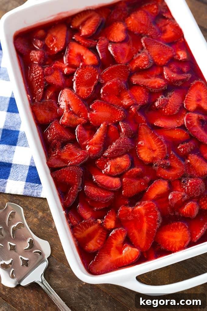 Strawberry Pretzel Jello Salad in white rectangular baking dish