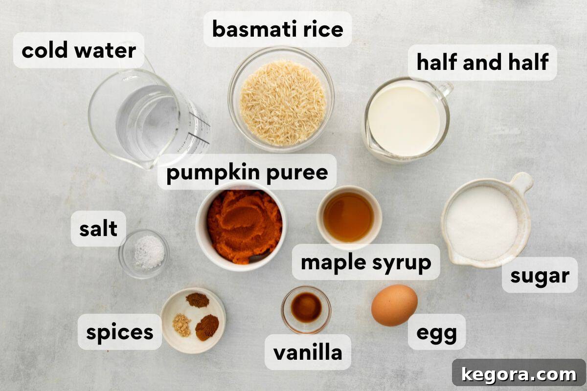 Spiced Pumpkin Rice Pudding 4 All the essential ingredients for pumpkin rice pudding, neatly measured and labeled on a rustic wooden surface.