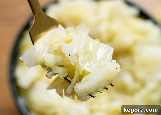 Perfect Instant Pot Buttered Cabbage 3 Close up of forkful of Instant Pot Buttered Cabbage