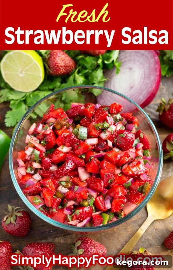 Fresh Strawberry Salsa in glass bowl with title and Simply Happy Foodie.com logo, formatted for Pinterest sharing
