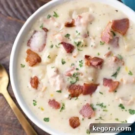 Slow Cooker Clam Chowder in a white bowl