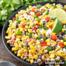 Elote Fiesta Salad 7 Mexican Street Corn Salad on a black plate