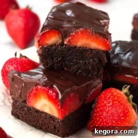 Chocolate Covered Strawberry Brownies on white plate