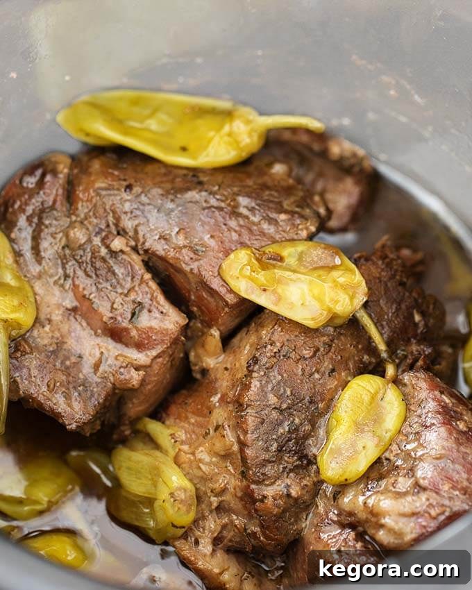 Close up of Instant Pot Mississippi Pot Roast in pressure cooker pot