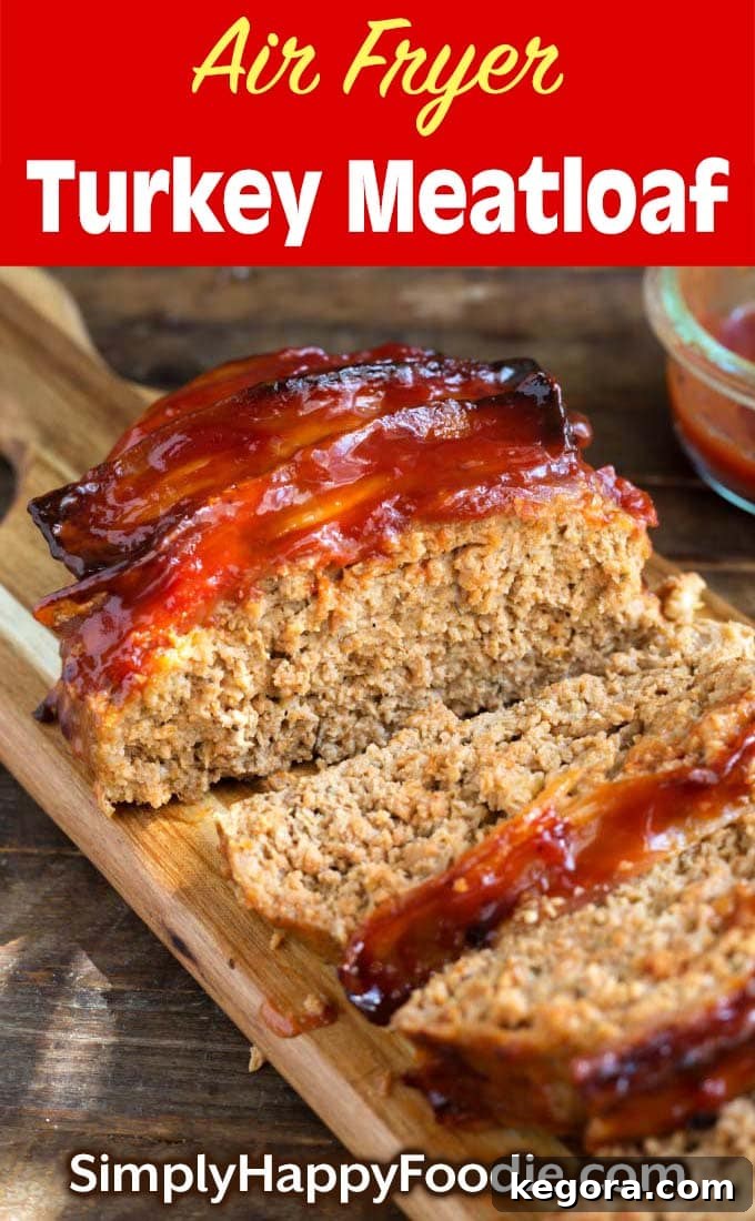 Air Fryer Turkey Meatloaf on wooden board with title and Simply Happy Foodie.com logo, perfect for Pinterest