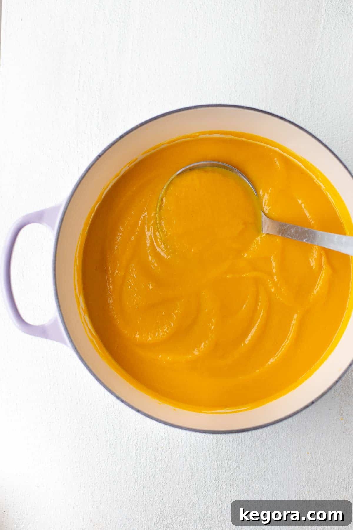 butternut squash leek soup simmering in a pot
