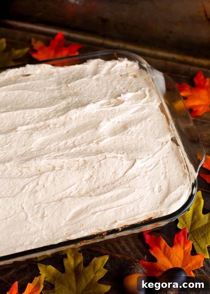 Spiced Pumpkin Cake with Cinnamon Butterscotch Frosting 3 Entire Pumpkin Cake with Cinnamon Butterscotch Frosting in glass casserole pan
