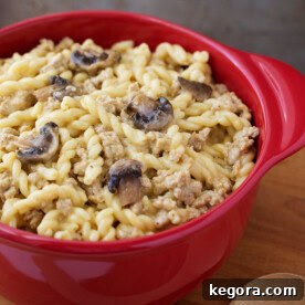 Instant Pot Cheeseburger Pasta in red bowl