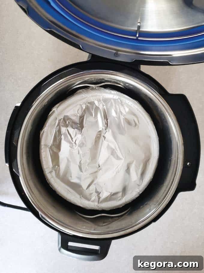 Speedy Instant Pot French Toast Bake 3 Casserole covered with foil using the Pot-in-Pot cooking techinque