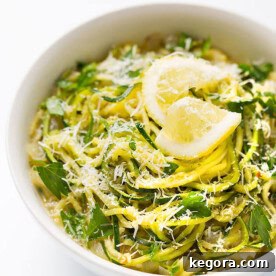 Zesty Lemon Garlic Zucchini Noodles 5 Lemon Garlic Zucchini Noodles in a white bowl