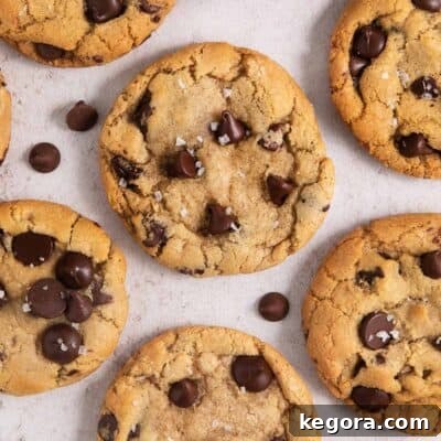 Close up image of perfectly baked gluten-free chocolate chip cookies, golden and inviting.