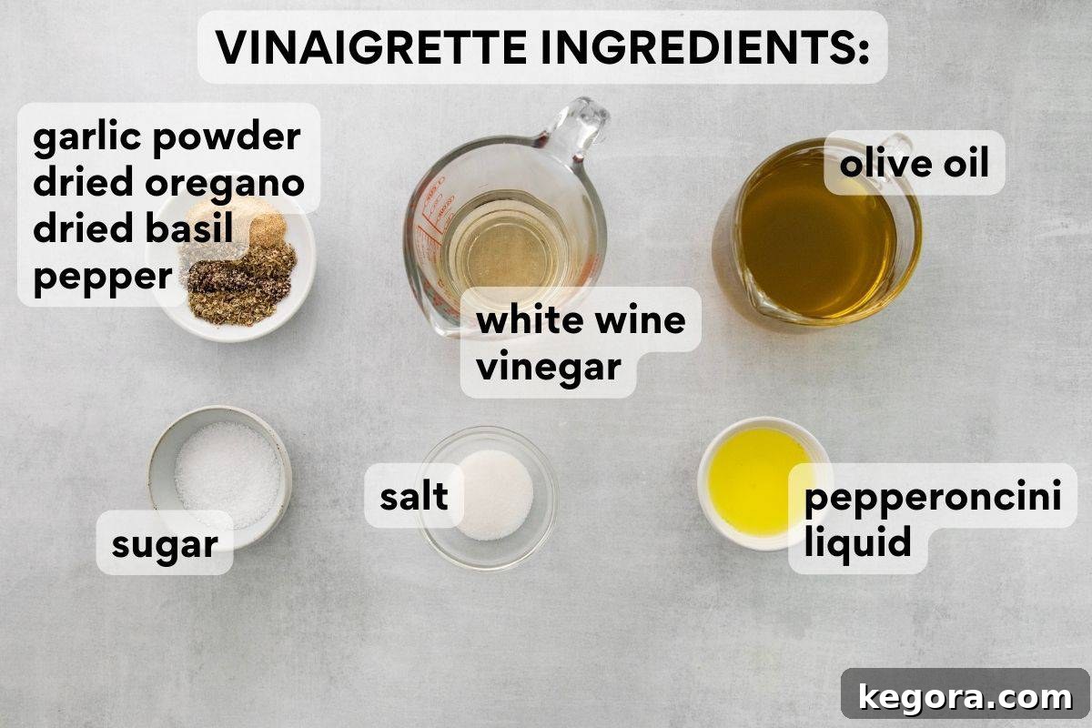 Vibrant Gluten-Free Italian Pasta Salad 5 vinaigrette ingredients pre-measured and labeled.