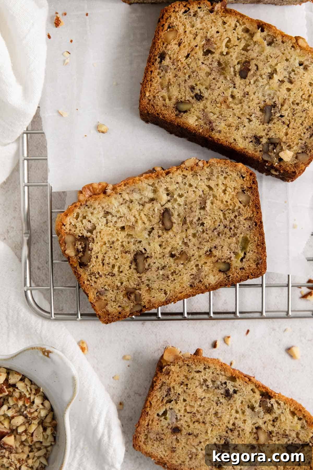 Overhead shot of gluten-free banana bread on a wire rack, freshly baked