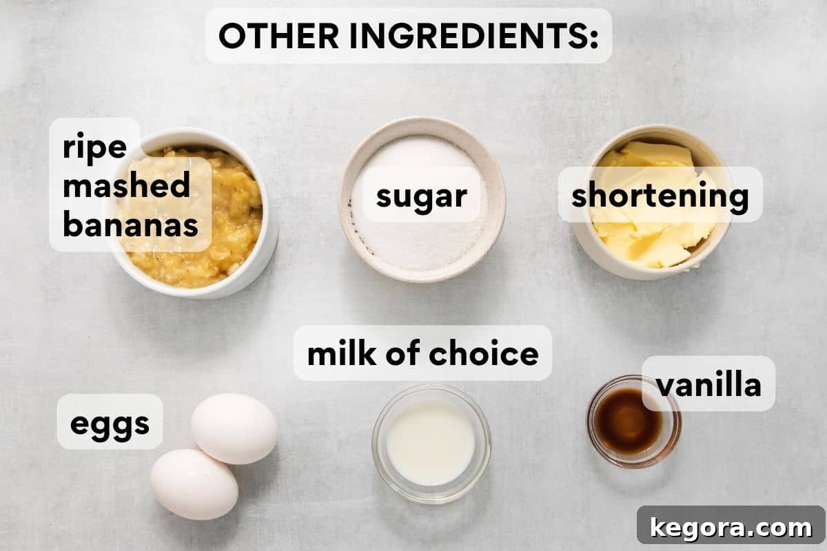 Another overhead shot of ingredients needed for gluten-free banana bread, focusing on wet ingredients