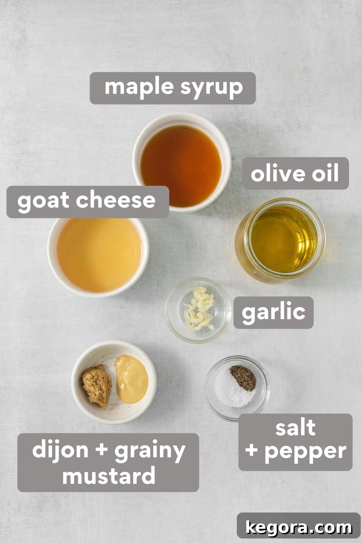 Ingredients for the maple vinaigrette dressing on a kitchen surface