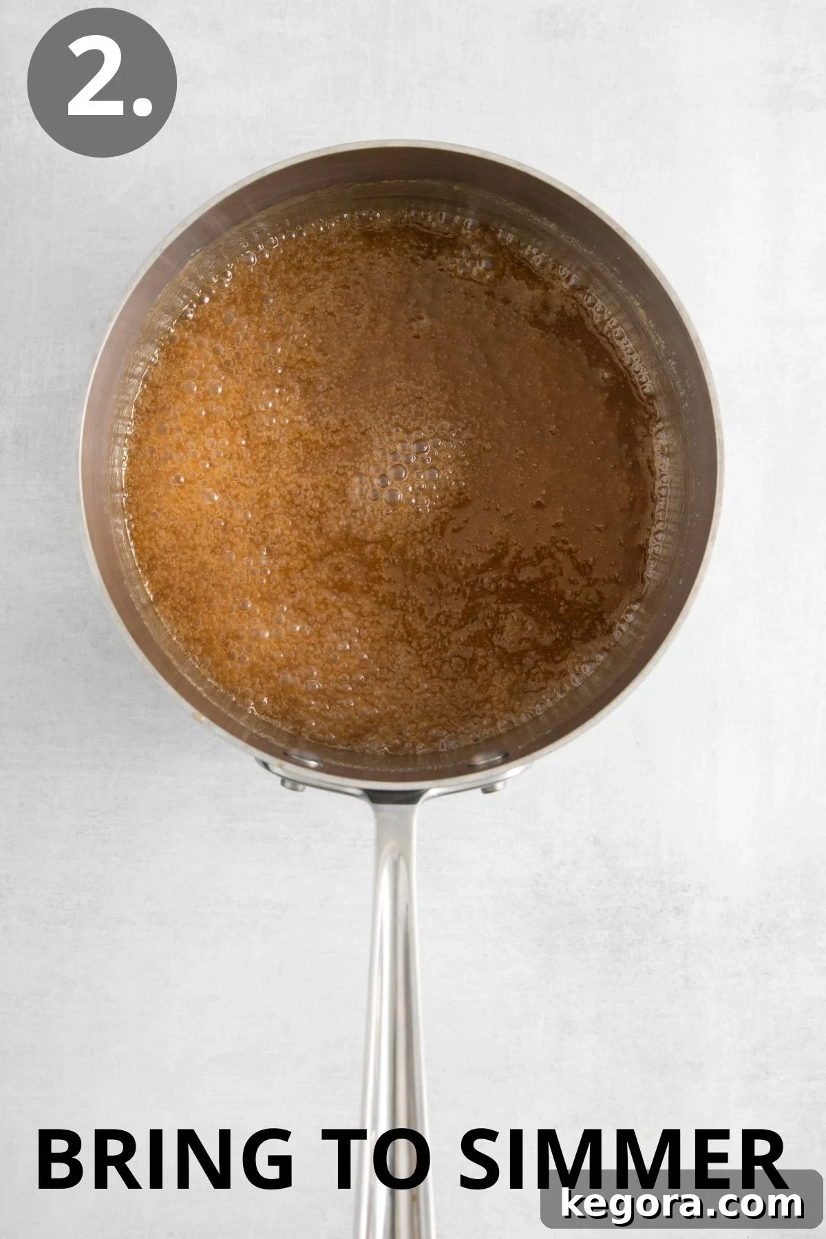 Simmering caramel in a sauce pan