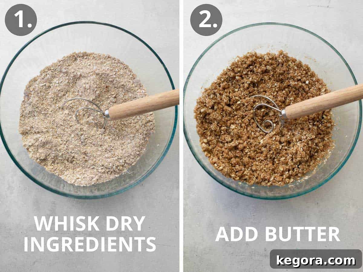 A glass bowl filled with dry ingredients like gluten-free oats, flour, and brown sugar, being whisked together with a wooden whisk, indicating the start of the baking process.