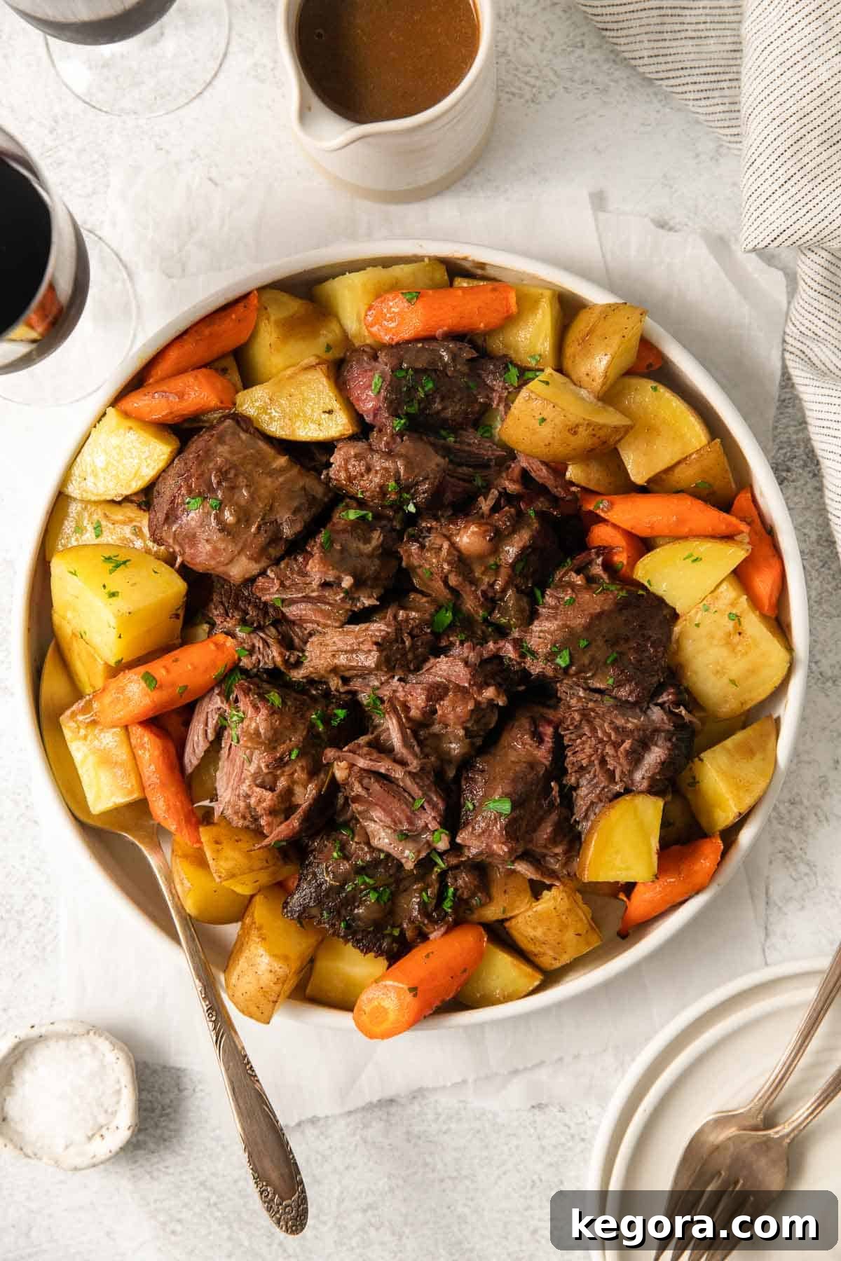 The Perfect Gluten-Free Family Pot Roast 8 A large, perfectly cooked gluten-free pot roast resting on a serving tray, ready to be carved