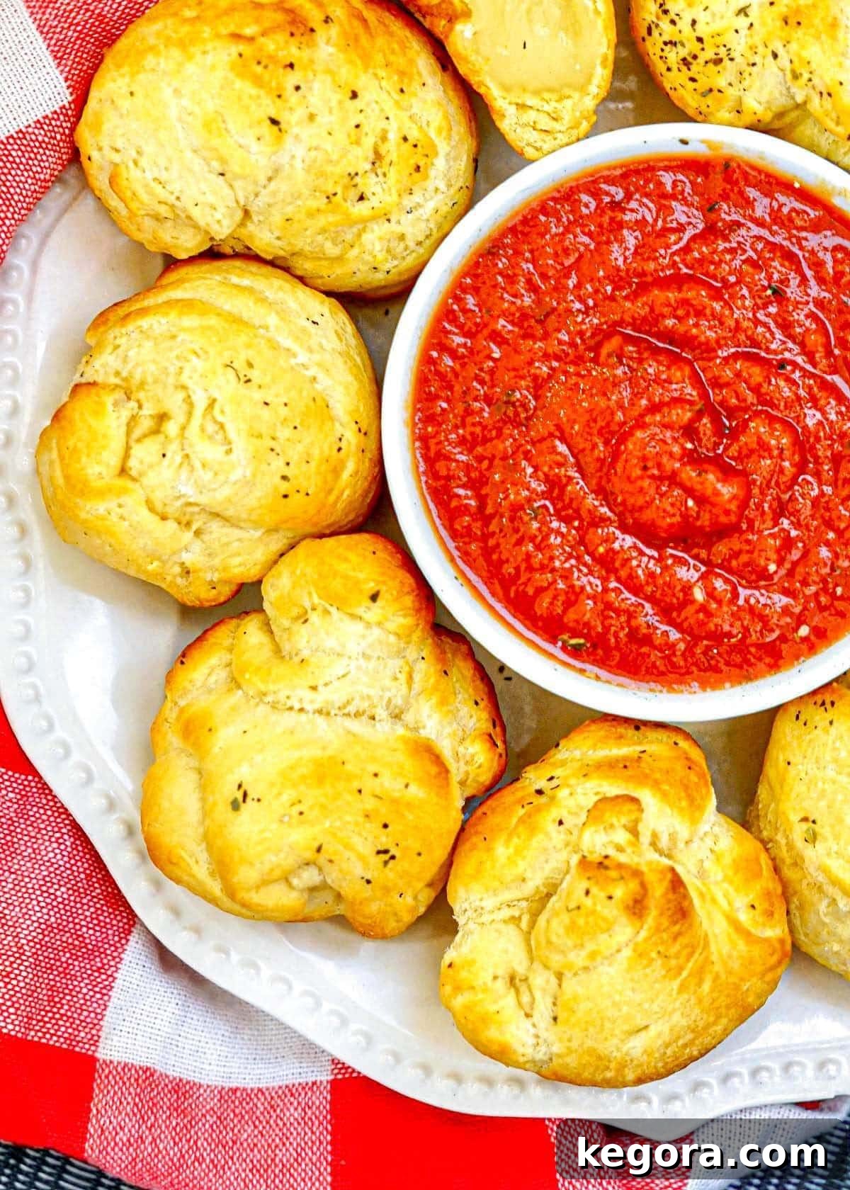 Air Fryer Mozzarella Balls close up with marinara sauce ready for dipping