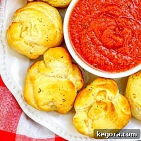 Air Fryer Mozzarella Balls close up with marinara sauce