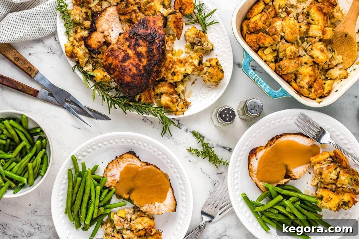 Air Fryer Turkey Breast served with traditional stuffing and cranberries, set on a beautifully arranged table for a festive meal.