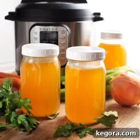 Instant Pot Turkey Broth in jars in front of IP