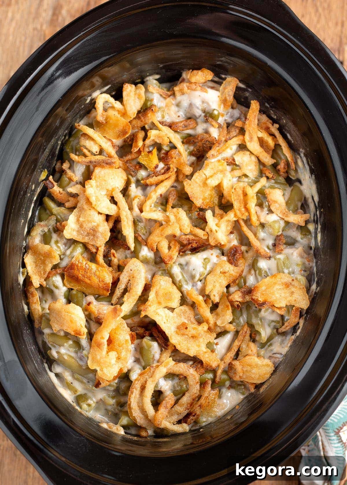 Slow Cooker Green Bean Casserole in black crock