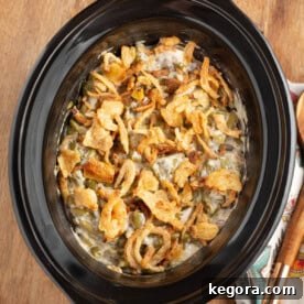 Slow Cooker Green Bean Casserole in a black crock