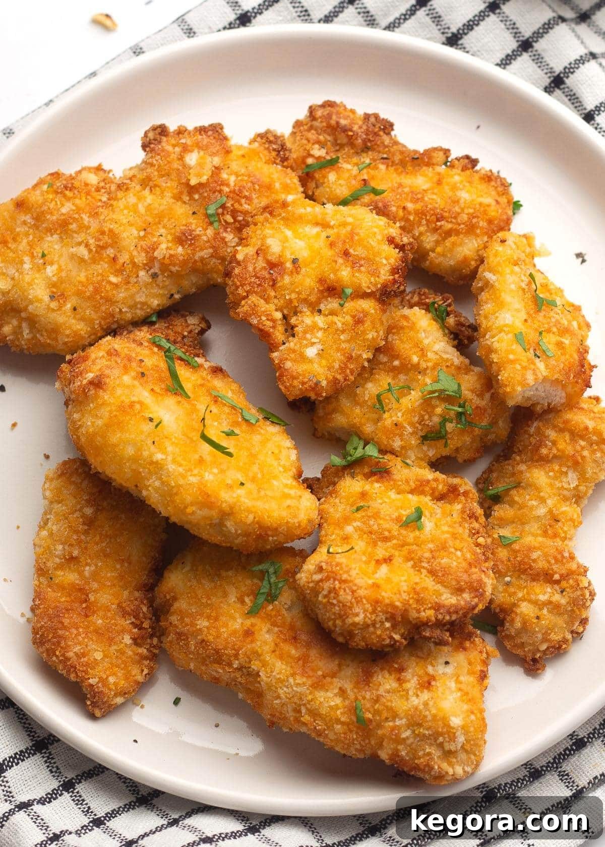 Crispy Air-Fried Nuggets 2 chicken nuggets on a white plate