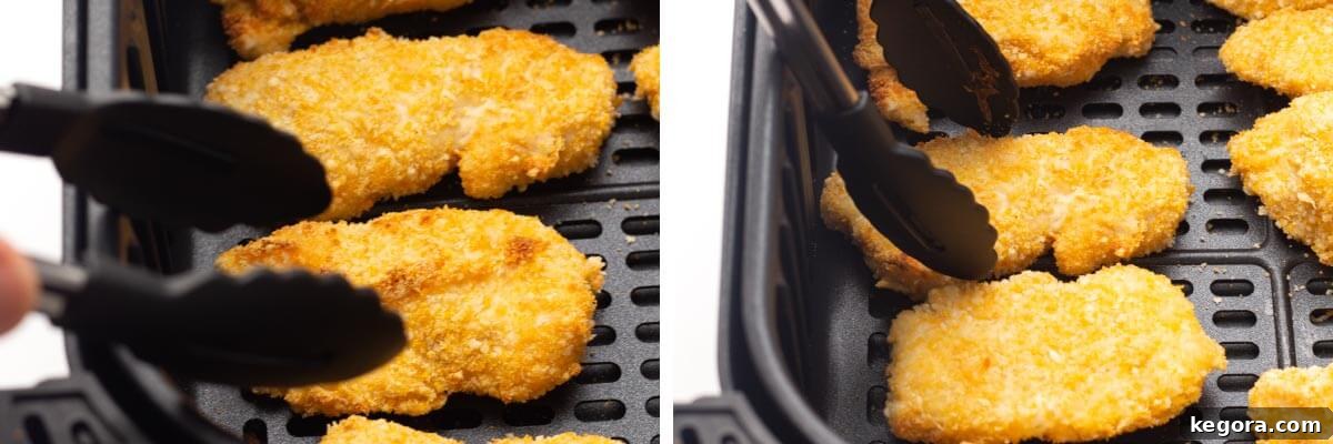 Crispy Air-Fried Nuggets 8 tongs ready to flip chicken nugget